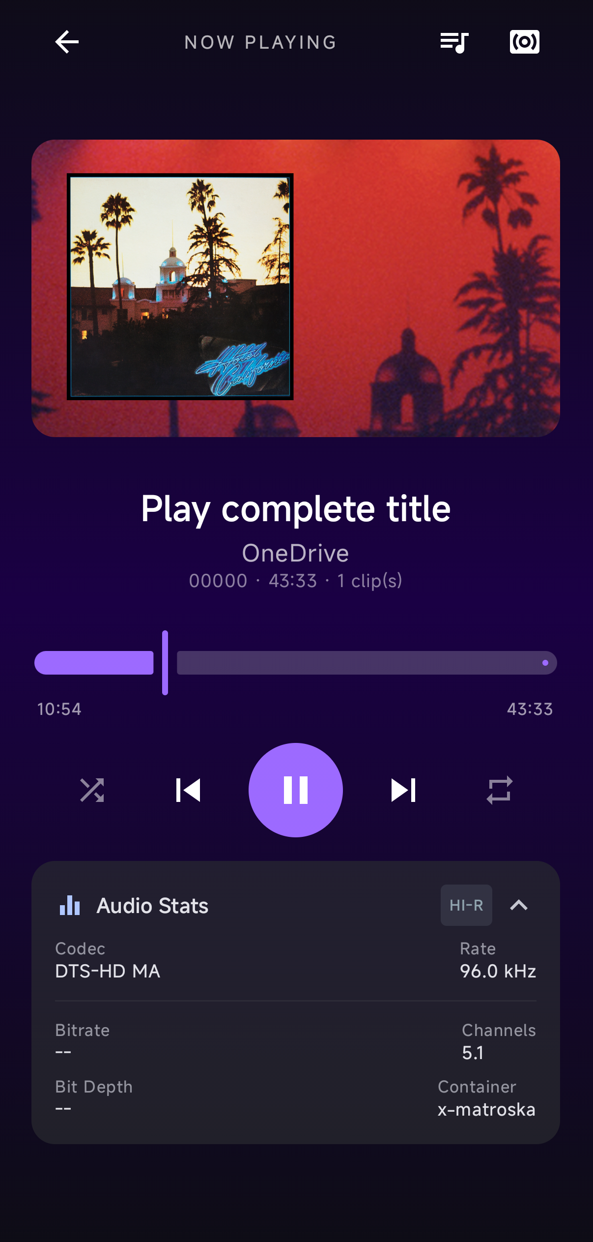 Ecrã de reprodução do Woobify com capa de álbum e informação DTS-HD MA